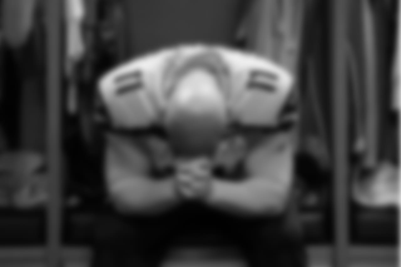 Seahawks kicker Sebastian Janikowski has a moment to himself in the locker room.