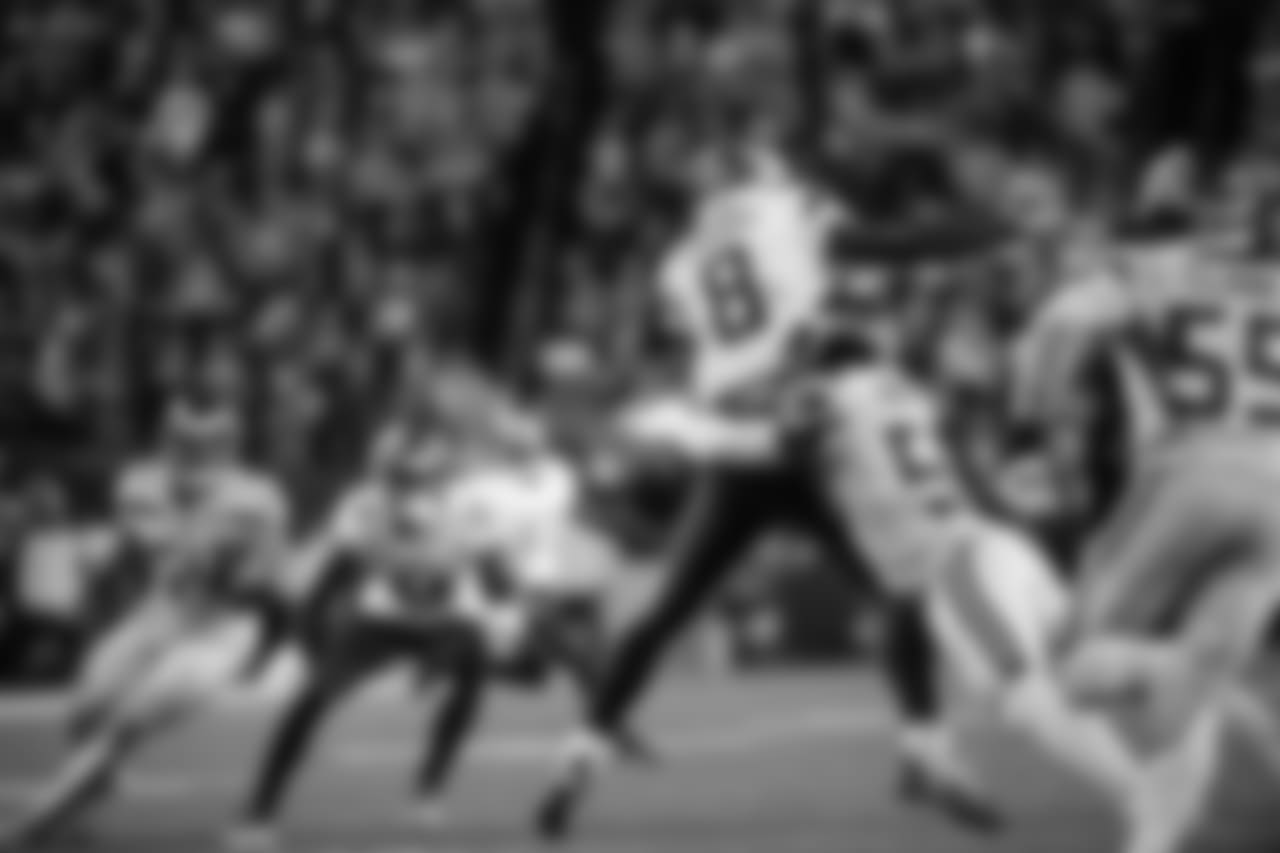 Seattle's Jacob Martin hits Vikings quarterback Kirk Cousins and knocks the ball loose.