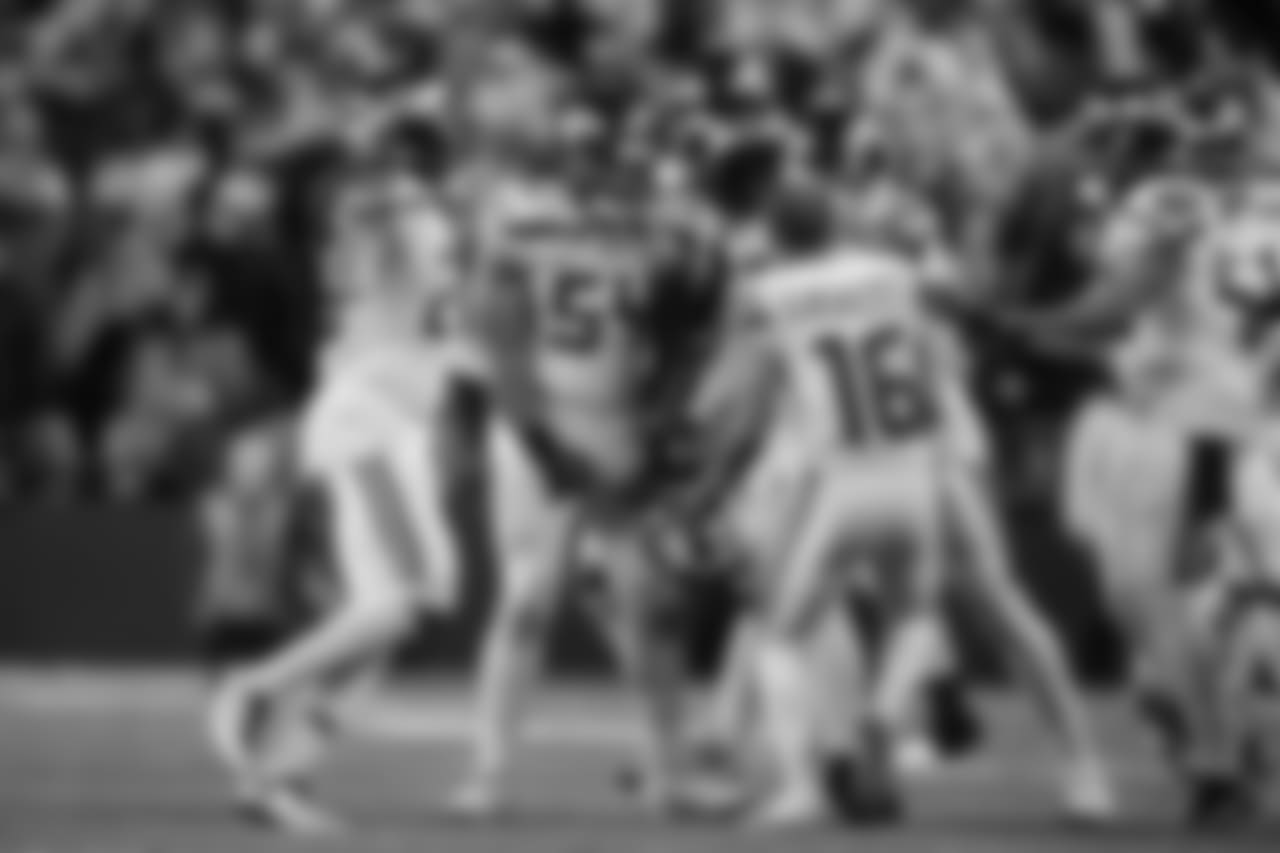 The Seahawks gather around Bobby Wagner after he leapt over the line of scrimmage to block a field goal in the fourth quarter.