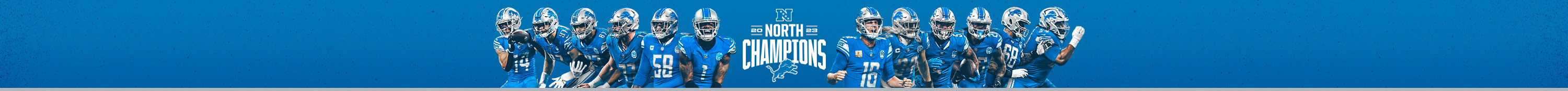 2023 NFC North Champions Lions banner. Banner includes images of several football players with on either side of the text "2023 North Champions".