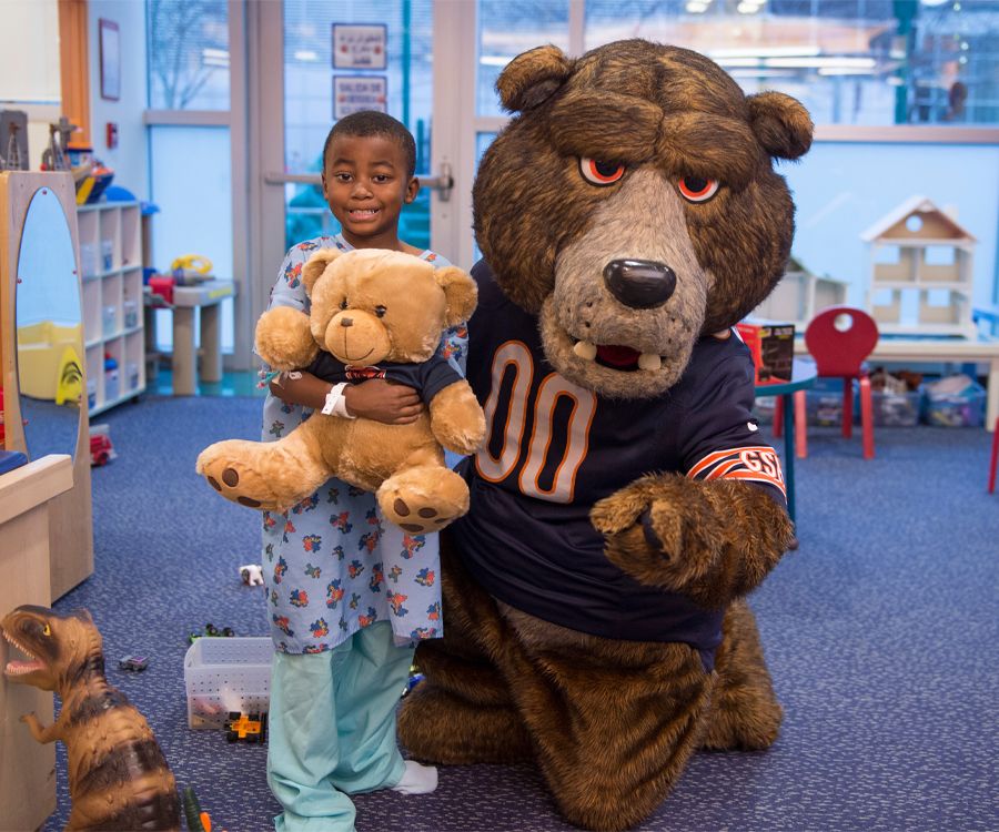 Chicago Bear assists with collections for new Welcome Center