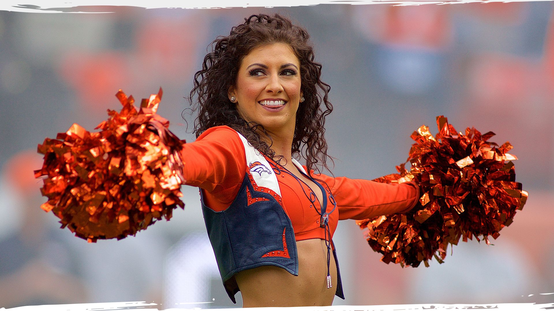 The Denver Bronco Cheerleaders perform during the Denver Broncos v