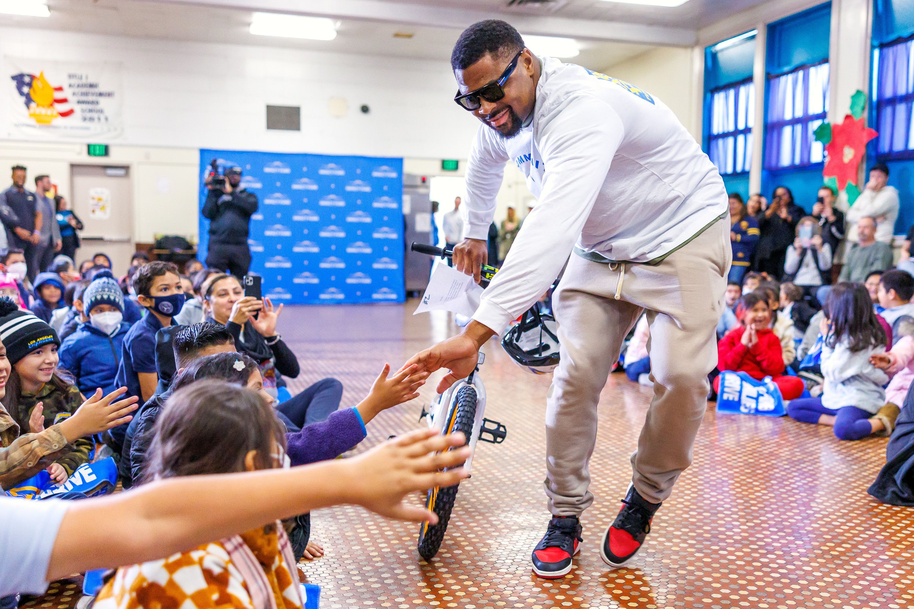 Los Angeles Chargers host their annual Bikes for Kids event on Tuesday, December 13, 2022 at Mayo Elementary School in Compton, CA.
