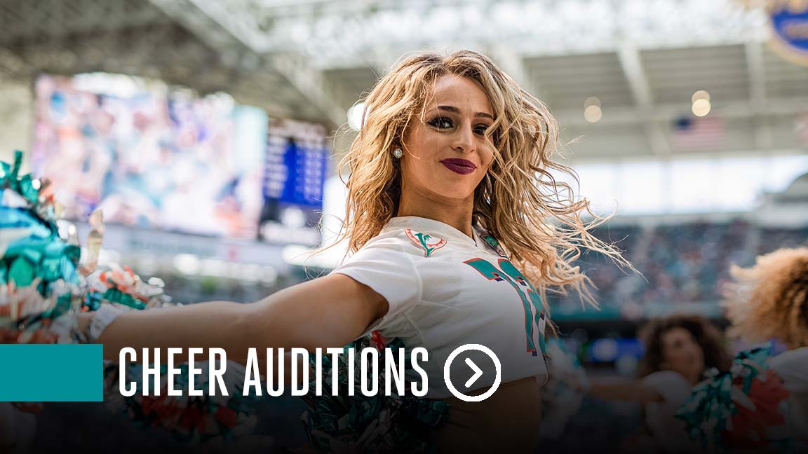 Miami. FL USA; Miami Dolphins cheerleaders wore festive red