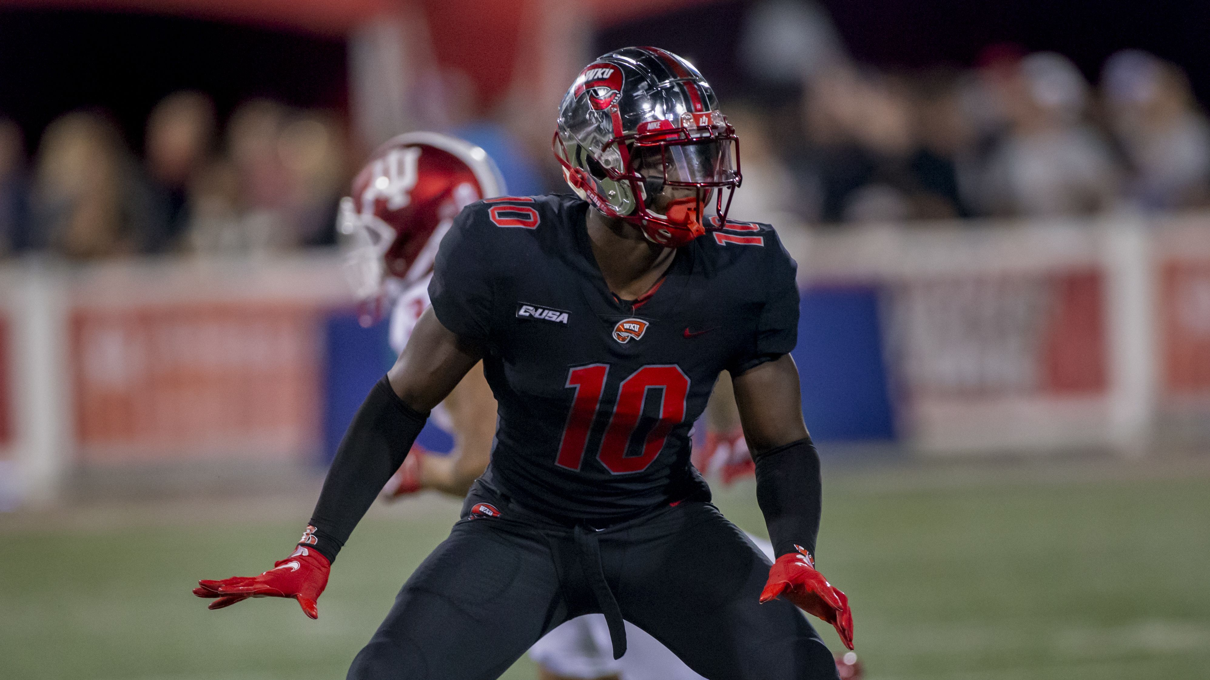 Western Kentucky University defensive end Deangelo Malone reacts to a play during an NCAA football game against Indiana University on Saturday, Sept. 25, 2021, in Bowling Green, KY. IU beat WKU 33-31. (AP Photo/James Kenney)