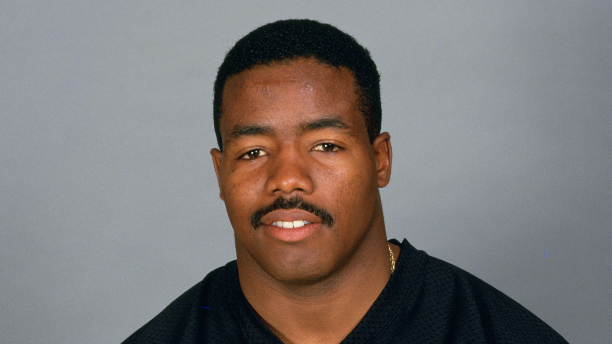 Los Angeles Raiders' veteran running back Frank Hawkins (27) heads