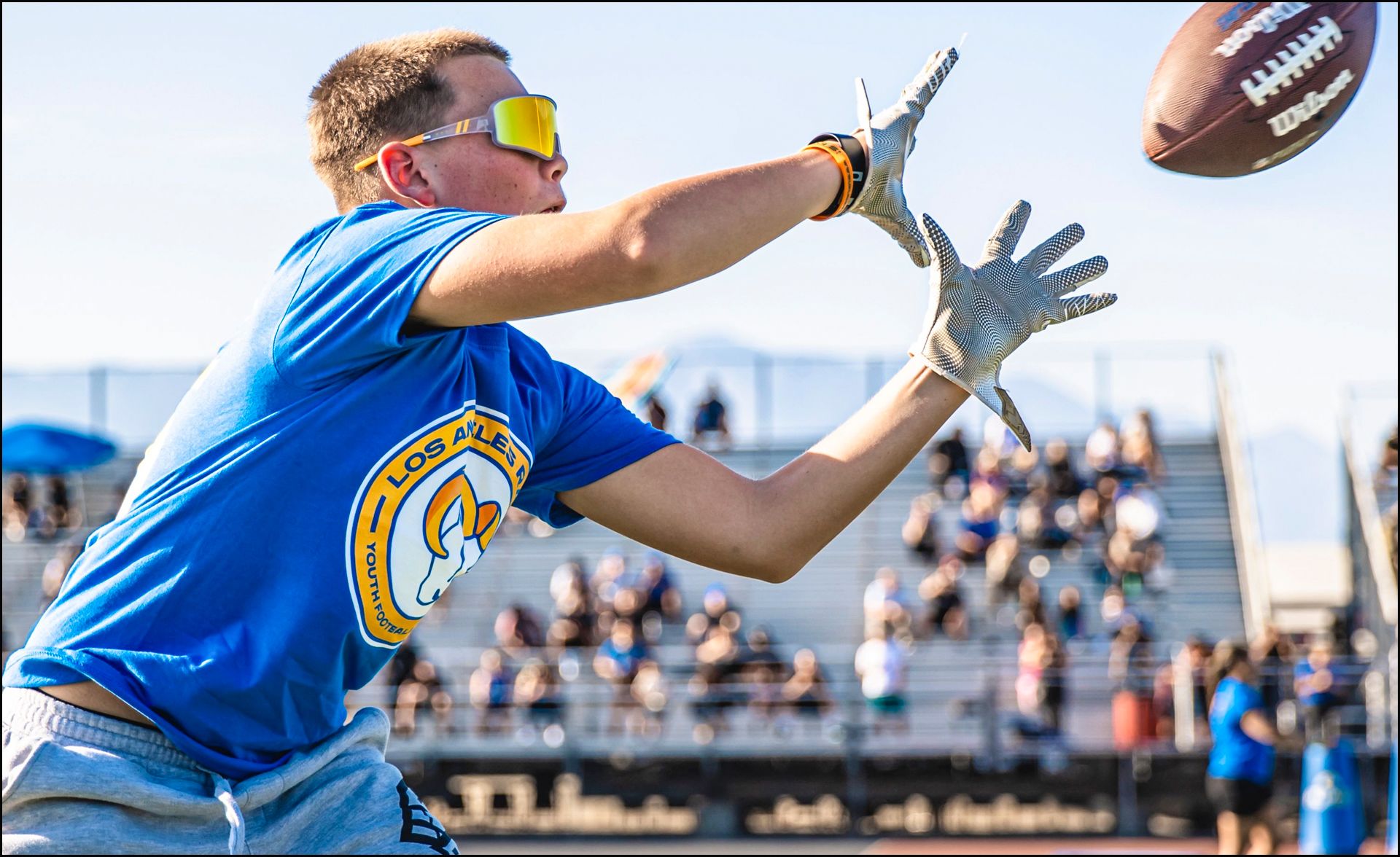 Youth and High School Football Camps featuring NFL players and coaches