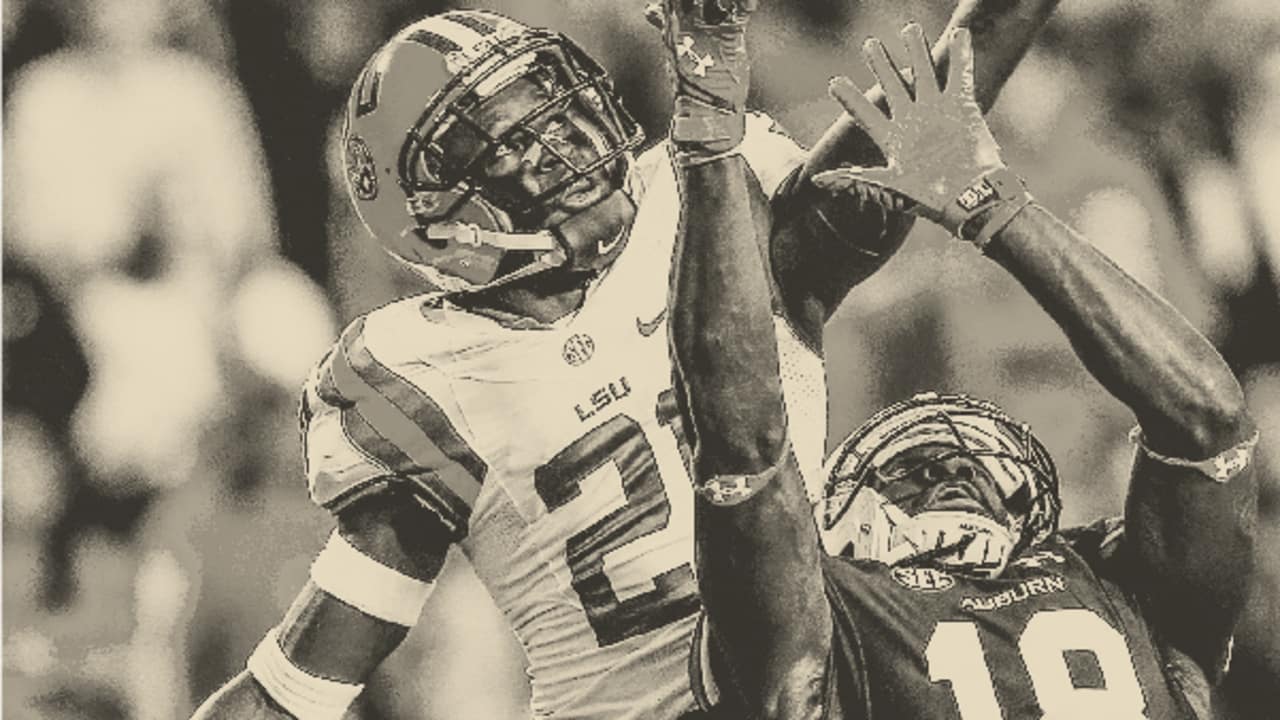 New York Jets cornerback Rashard Robinson gestures while working