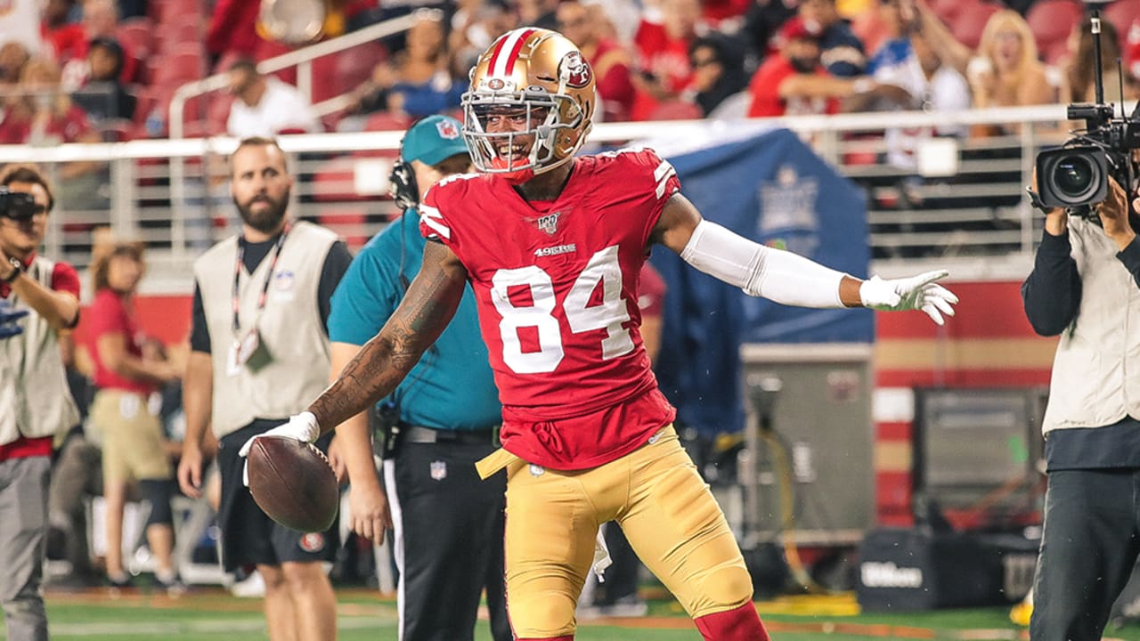 San Francisco 49ers' Kendrick Bourne (84) runs against Kansas City Chiefs'  Charvarius Ward (35) …