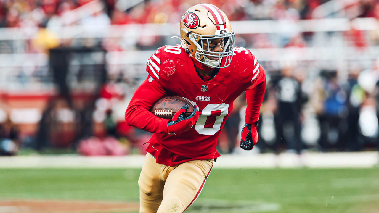 San Francisco 49ers safety George Odum (30) runs after an interception  during an NFL football game against the Arizona Cardinals, Sunday, Jan.8,  2023, in Santa Clara, Calif. (AP Photo/Scot Tucker Stock Photo 