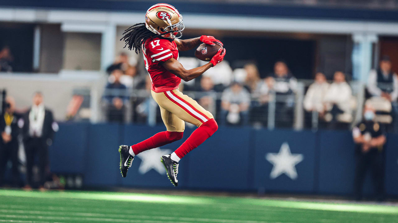 San Francisco 49ers' Travis Benjamin (17) is hugged by teammates