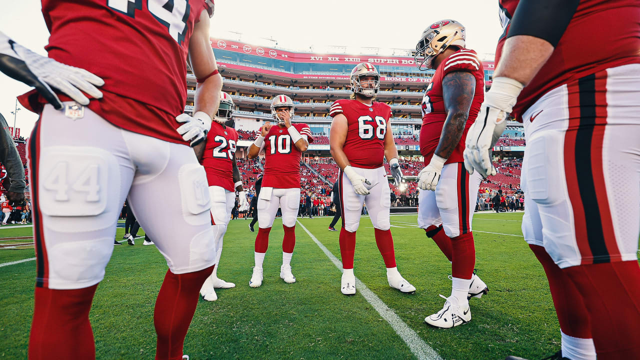 San Francisco 49ers safety Talanoa Hufanga, left, poses for photos