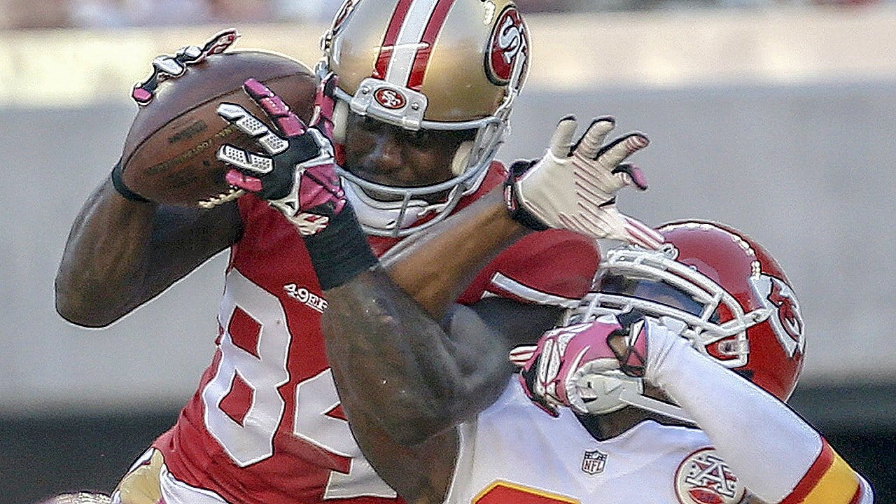 Wide receiver Brandon Lloyd of the San Francisco 49ers comes down