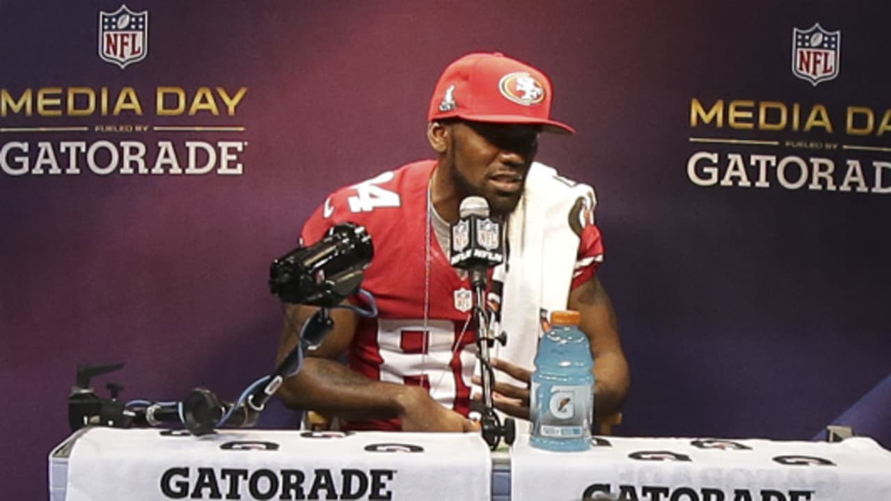 Wide receiver Randy Moss of the Minnesota Vikings smiles as he talks