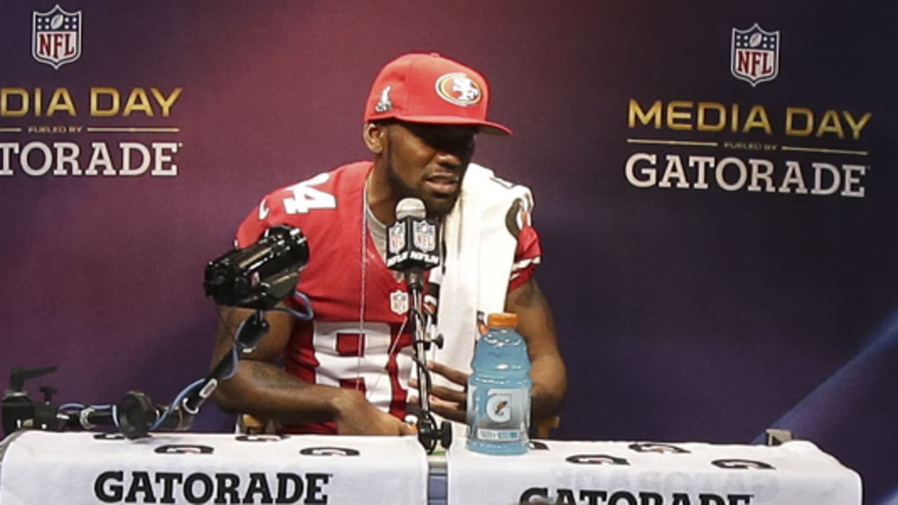 Wide receiver Randy Moss of the Minnesota Vikings smiles as he talks