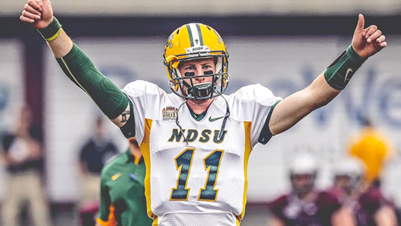 North Dakota State quarterback Carson Wentz holds his jersey after