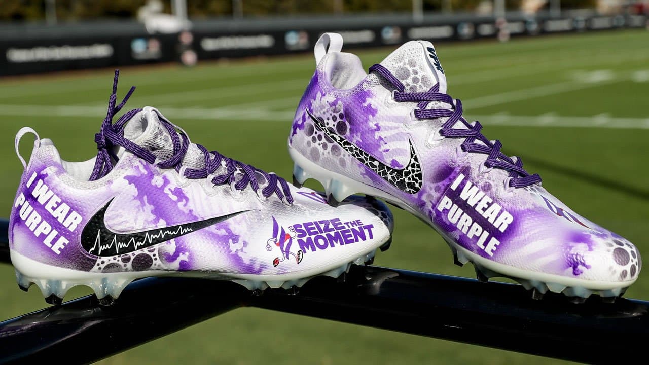 Los Angeles Rams Nike cleats on the sidelines during an NFL Wild