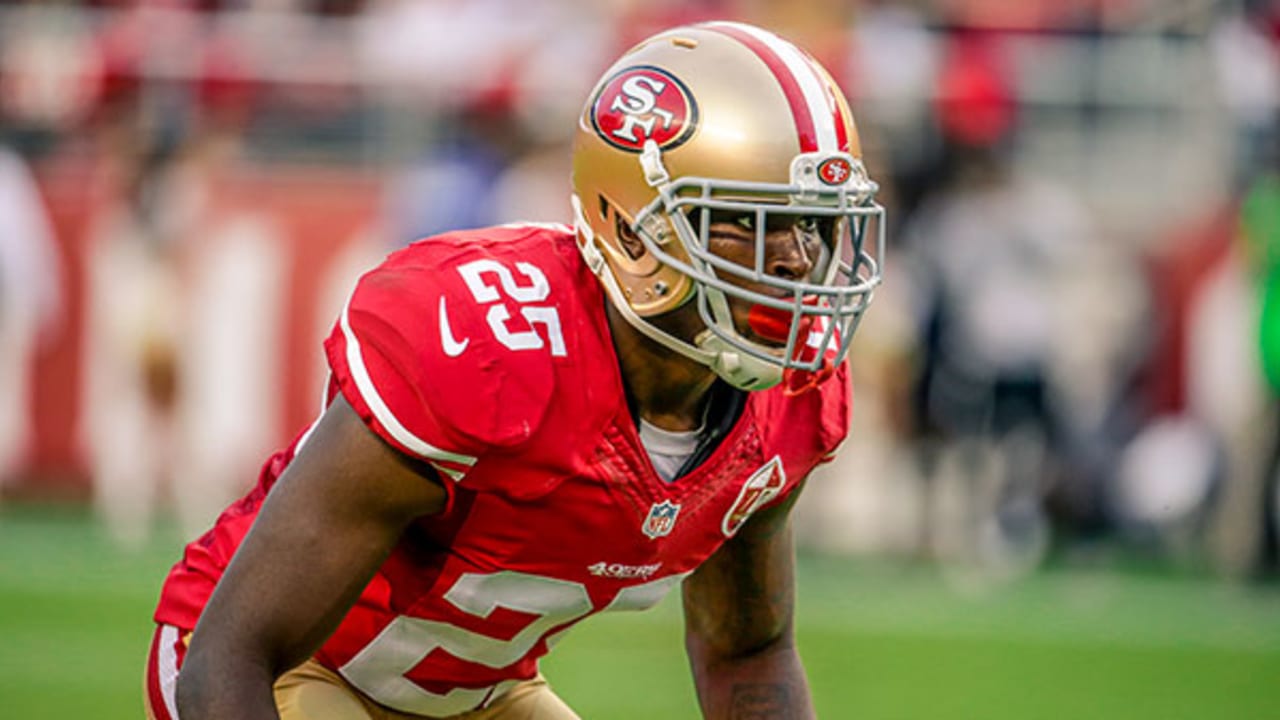 San Francisco 49ers cornerback Terrance Mitchell, center, scores a  touchdown while being tackled by Los Angeles Rams safety John Johnson III  during the first half of an NFL football game Sunday, Sept.