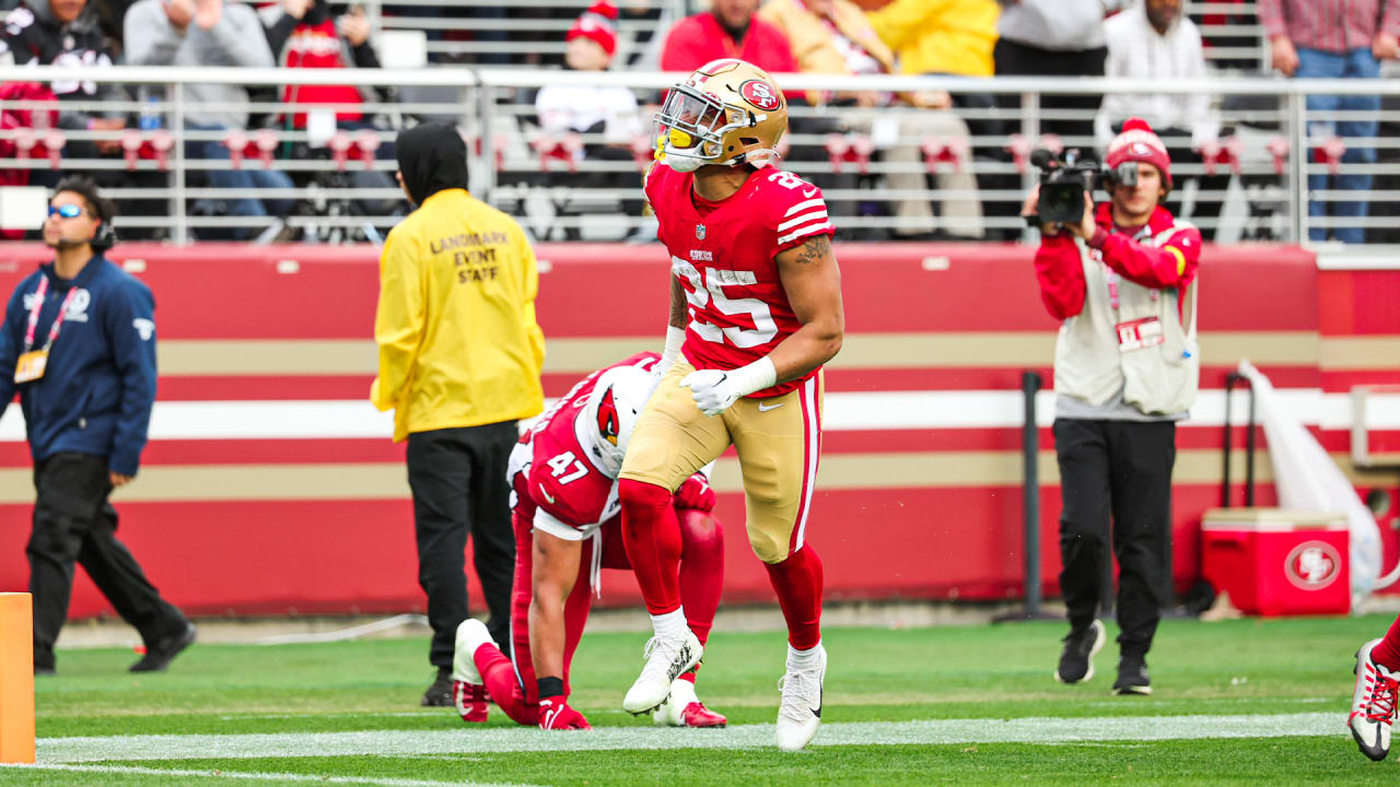 San Francisco 49ers running back Elijah Mitchell (25) runs during an NFL  divisional round playoff football game against the Dallas Cowboys, Sunday,  Jan. 22, 2023, in Santa Clara, Calif. (AP Photo/Scot Tucker