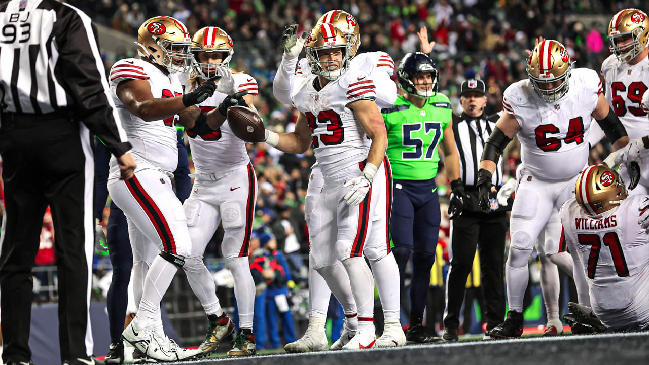 Christian McCaffrey Hurdles Cardinals Defender On the Way to his Second TD