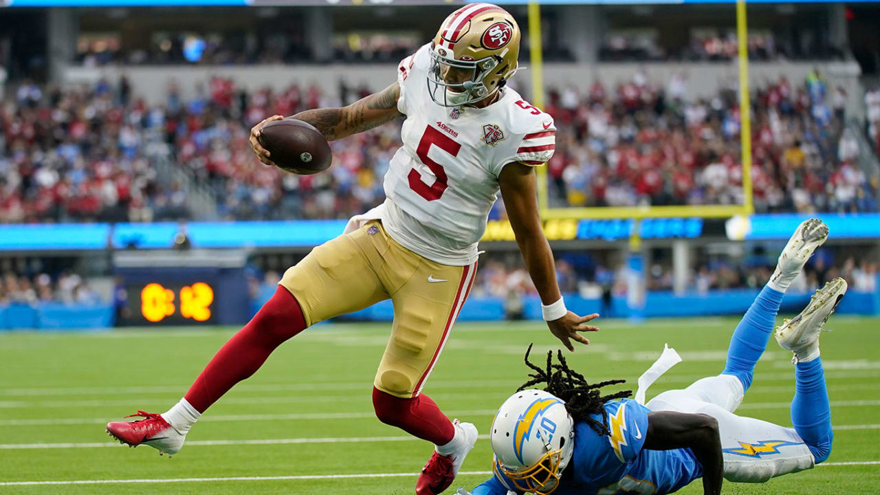 San Francisco 49ers quarterback Trey Lance warms up in a Crucial