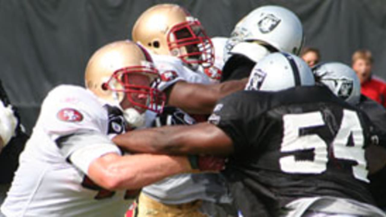 Tackle Kwame Harris of the San Francisco 49ers takes a break against