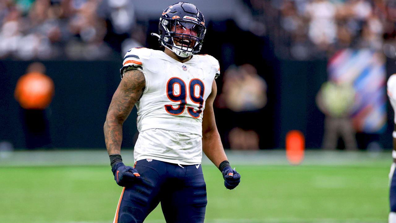 Chicago Bears defensive end Trevis Gipson (99) runs off the field