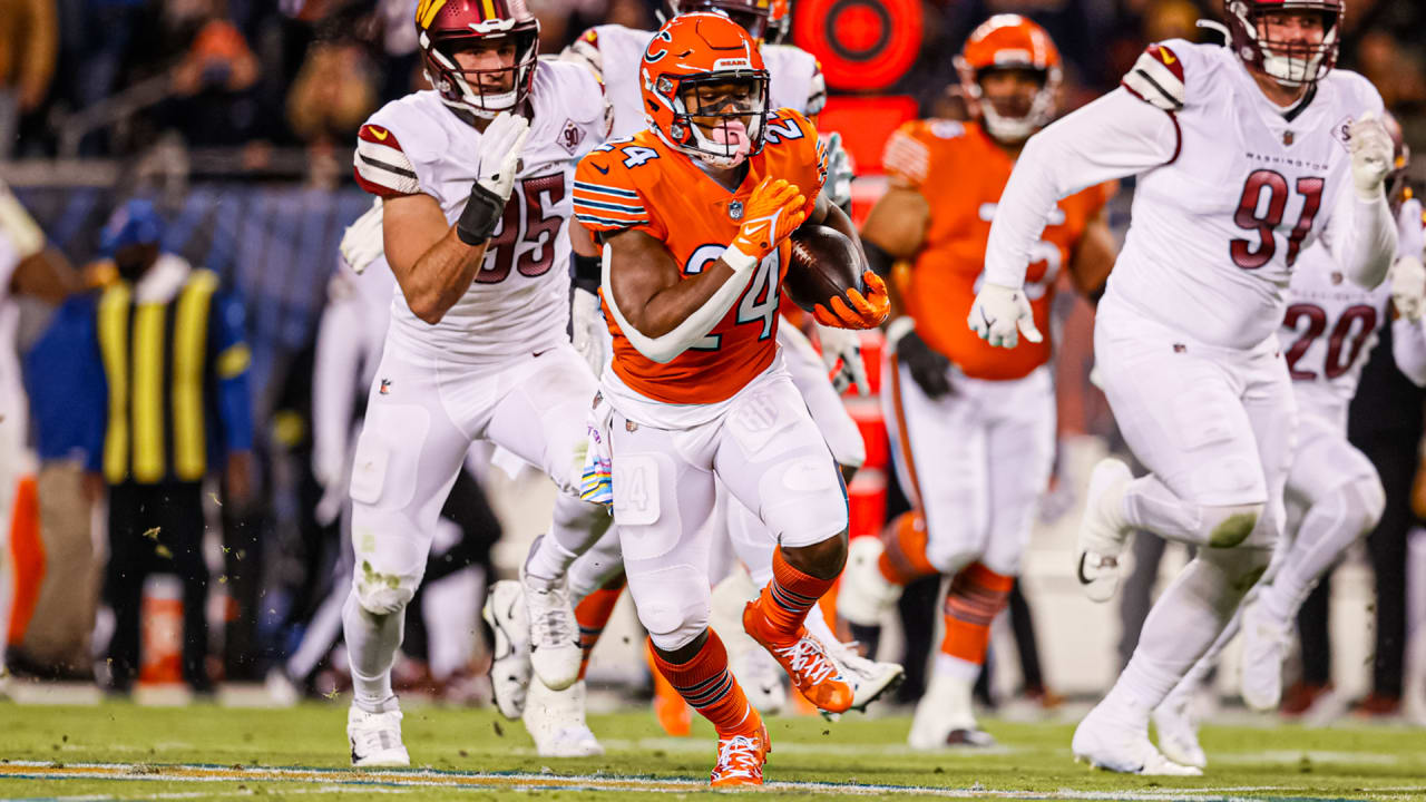 Chicago Bears tight end Cole Kmet is hit by Washington Commanders  linebacker Jamin Davis after a catch in the first half of an NFL football  game in Chicago, Thursday, Oct. 13, 2022. (