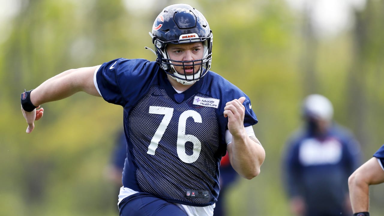 Chicago Bears offensive tackle Teven Jenkins (76) runs off the