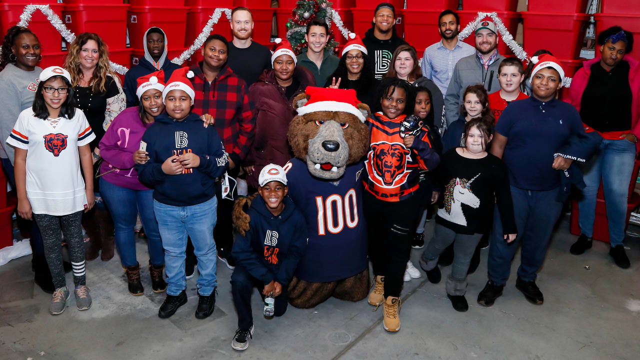 Packers players celebrate holiday season by shopping with kids at Meijer