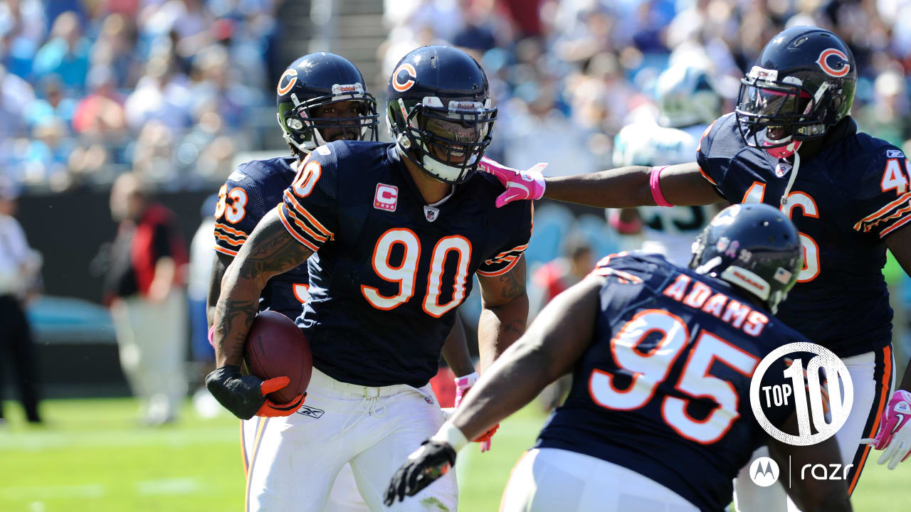 Chicago Bears defensive end Julius Peppers (90) sits on the bench