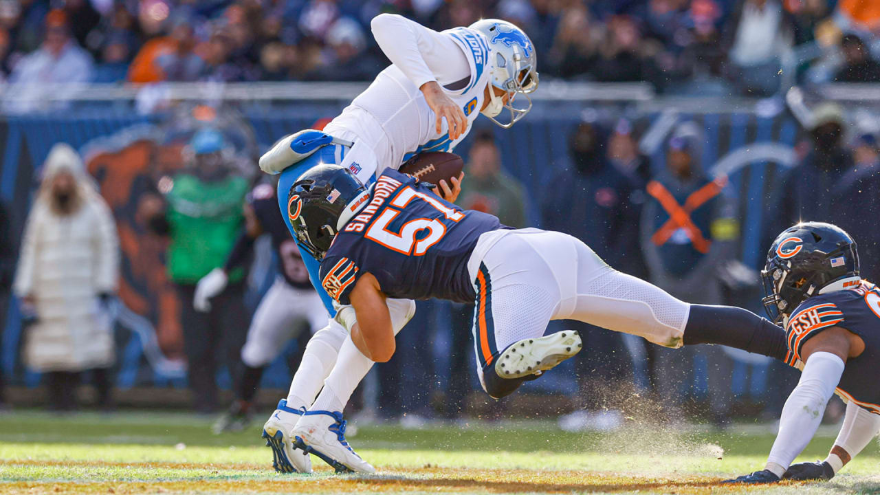 Chicago Bears linebacker Jack Sanborn (57) runs after the ball