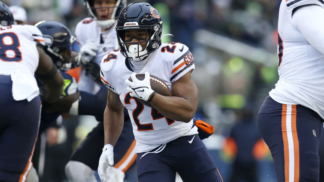 Khalil Herbert of the Chicago Bears runs with the ball during the