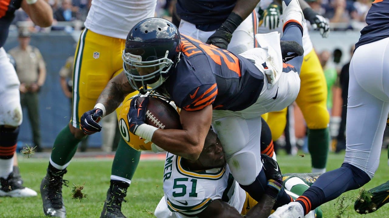 Chicago Bears running back Matt Forte (22) eludes tackles on his way to a  22-yard touchdown against the New York Jetsin the first half an NFL  football game in Chicago, Sunday, Dec.