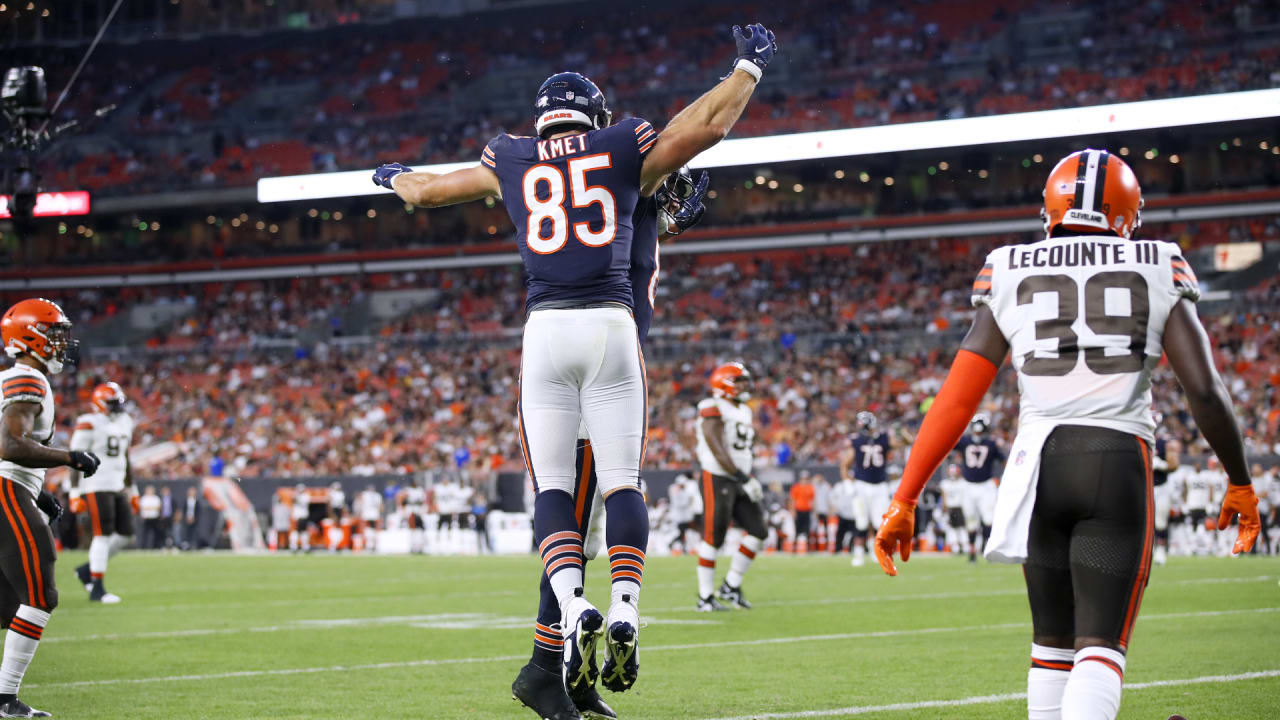 Chicago Bears quarterback Justin Fields twists body for sidearm completion  to tight end Cole Kmet to move chains