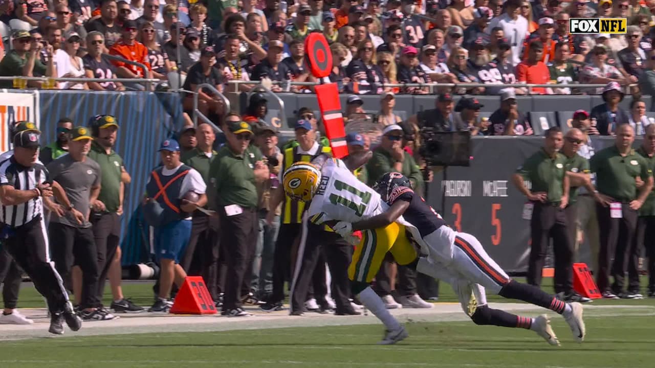 Jayden Reed stretches out for 30-yard catch from Love