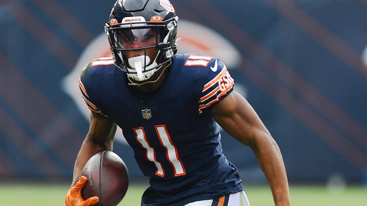 Damien Williams (8) of the Chicago Bears is pushed out of bounds