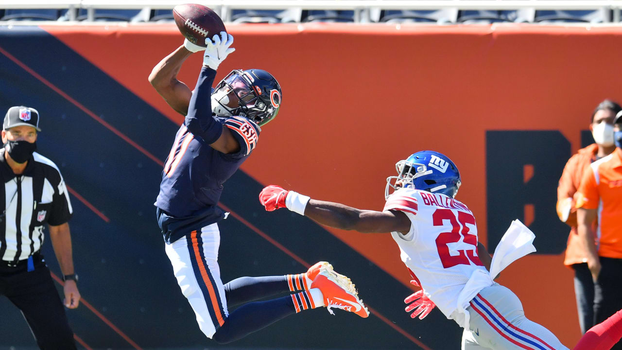 Chicago Bears wide receiver Darnell Mooney tries to break away