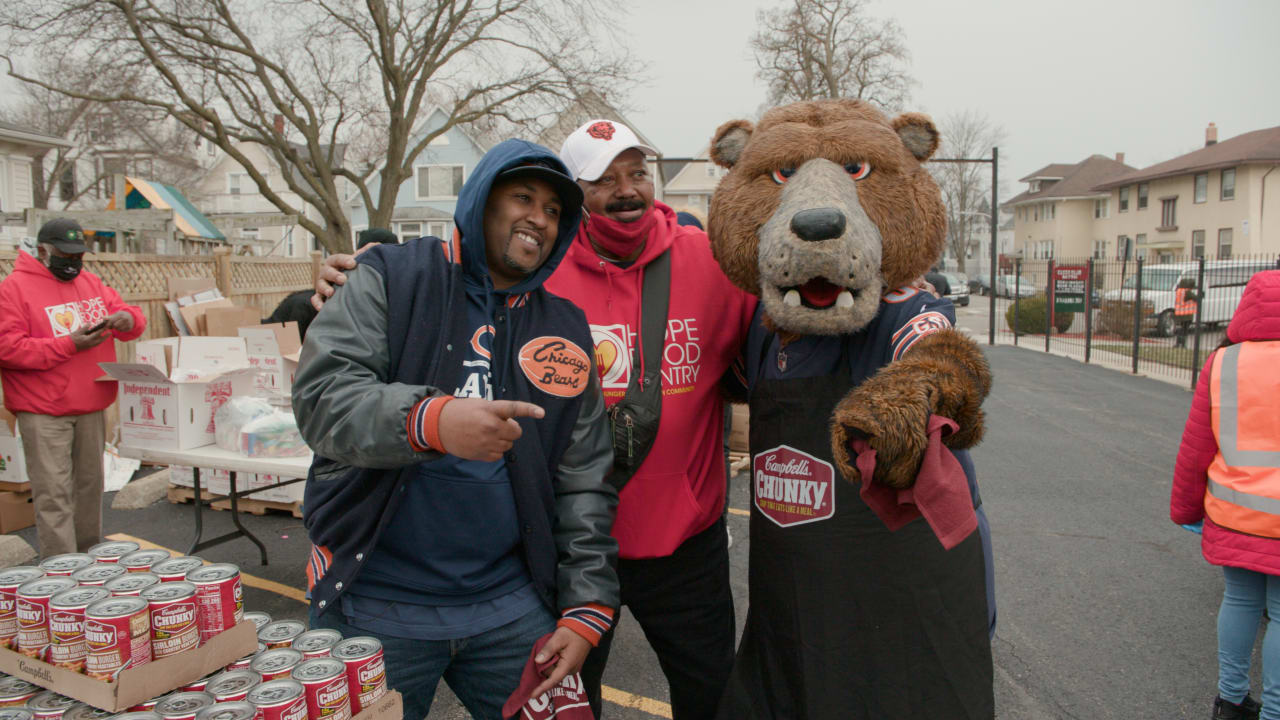 The Chicago Bear mascot, Staley, runs onto the field during