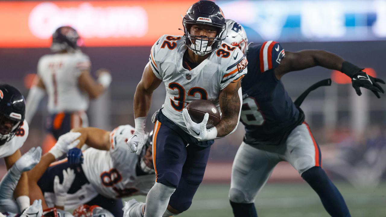 Chicago, United States. 04th Dec, 2022. Chicago Bears running back David  Montgomery (32) celebrates a second quarter touchdown against the Green Bay  Packers at Soldier Field in Chicago on Sunday, December 4