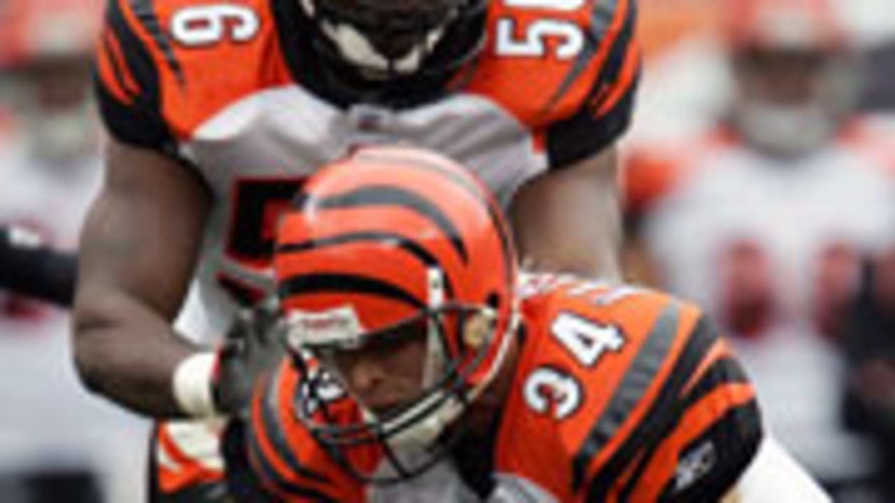 Cincinnati Bengals safety Kevin Kaesviharn (34) sacks Oakland