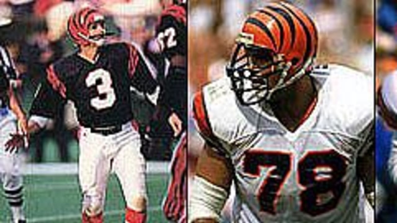 Former Cincinnati Bengals players Tim Krumrie, left, Max Montoya