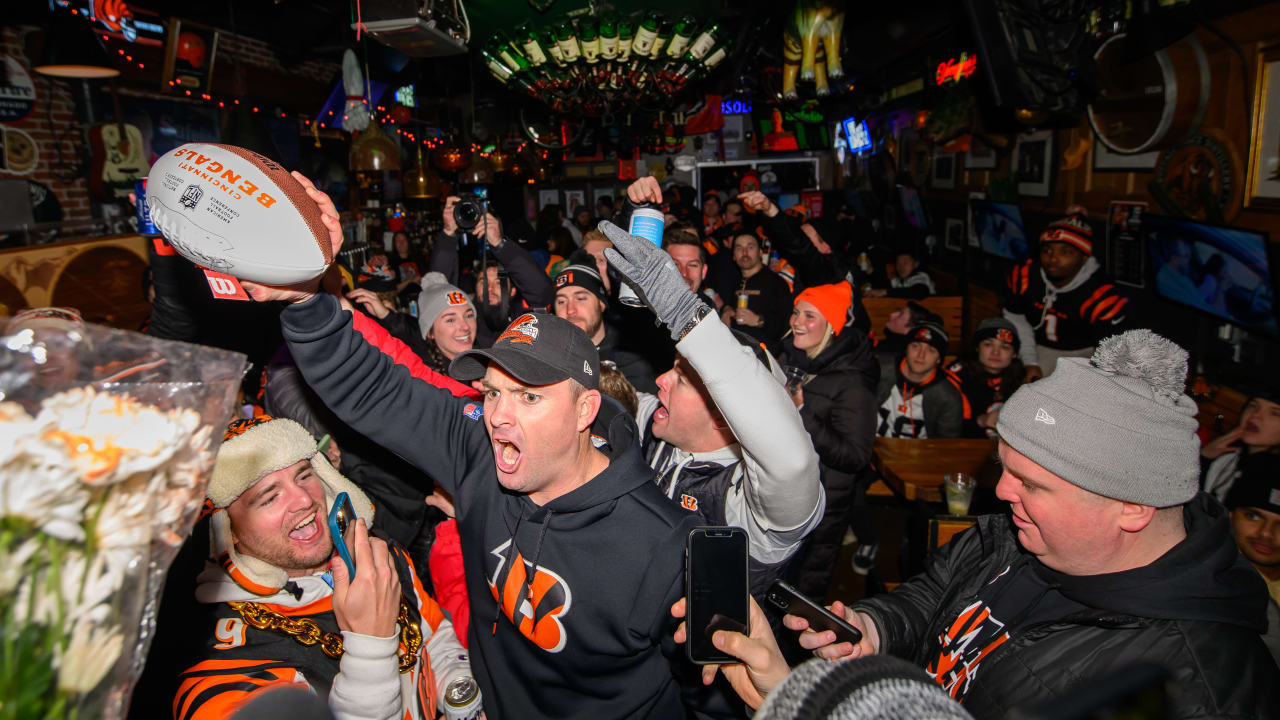 PHOTOS: Zac Taylor Delivers Game Ball to Local Bar