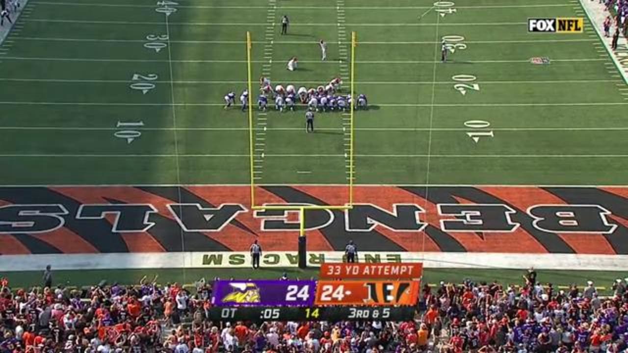 Cincinnati Bengals tight end C.J. Uzomah (87) leaps in the air to celebrate  against the Minnesota Vikings during an NFL football game, Sunday, Sept.  12, 2021, in Cincinnati. The Bengals won 27-24. (