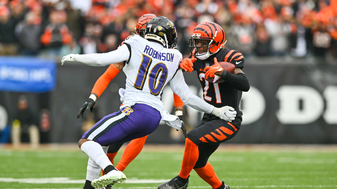 Photo: Bengals Mike Hilton tackles Raven quarterback Anthony Brown -  KYP20230108020 