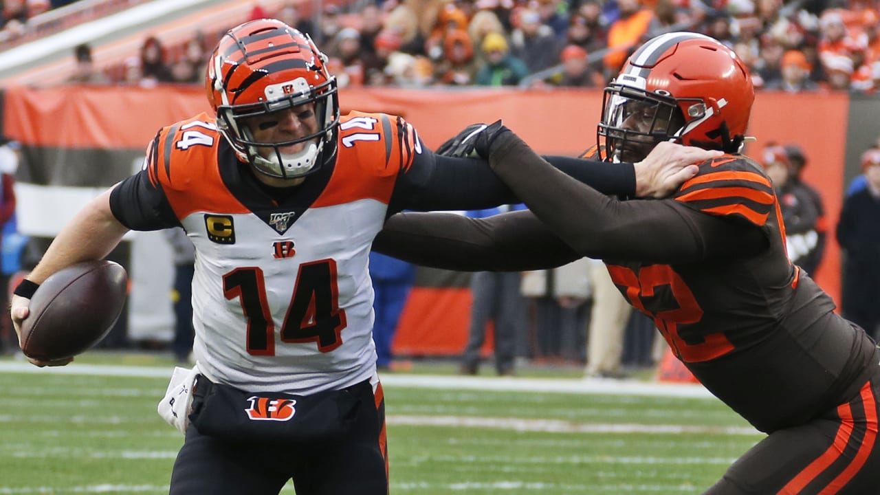 Cincinnati Bengals wide receiver Alex Erickson (12) makes a reception  against Cleveland Browns cornerback Denzel Ward (21) during the second half  of an NFL football game, Sunday, Dec. 8, 2019, in Cleveland. (