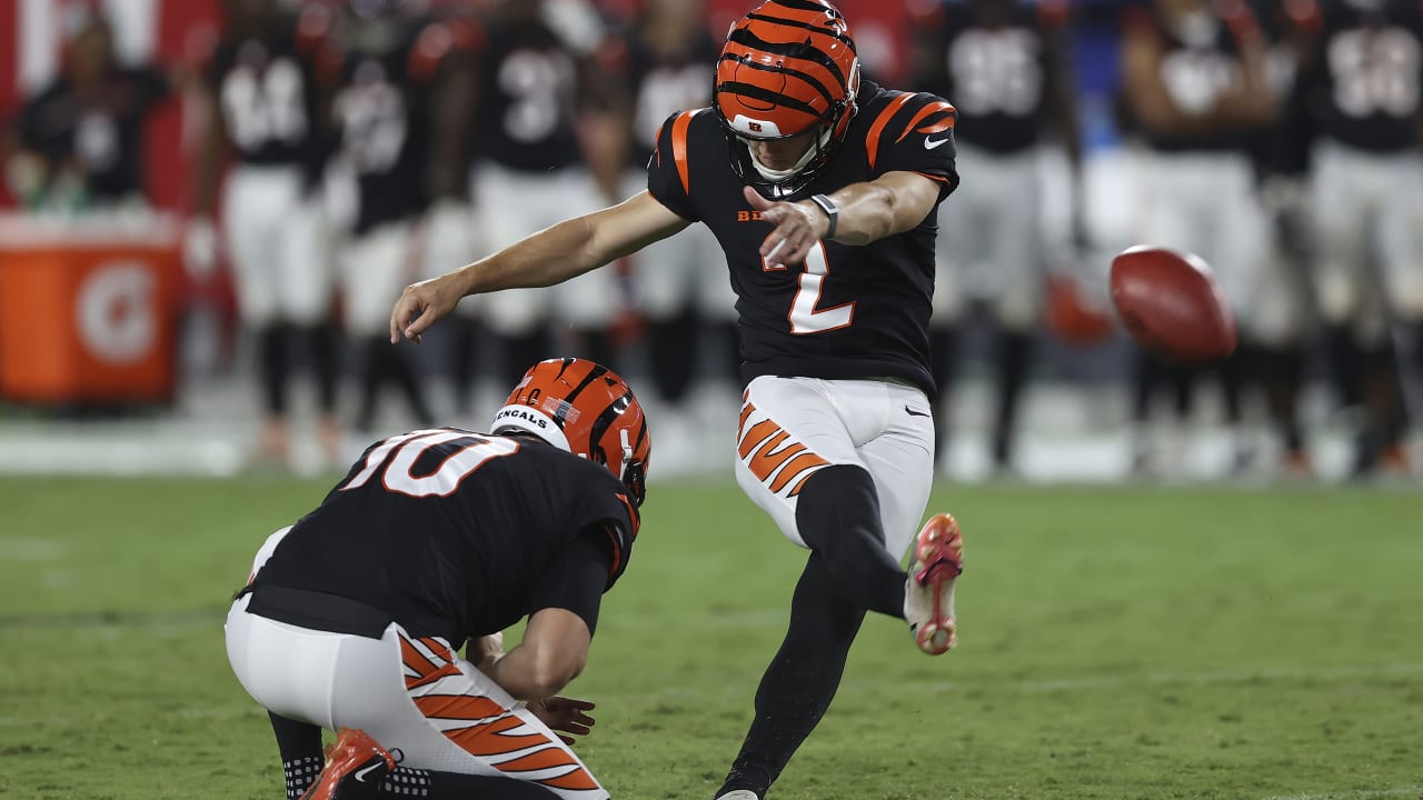 Cincinnati Bengals quarterback Brandon Allen (8) hands the ball off against  the Tampa Bay Buccaneers in a pre-season NFL football game, Saturday, Aug.  14, 2021 in Tampa, Fla. (AP Photo/Alex Menendez Stock