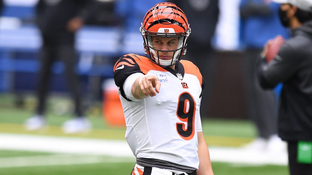 Joe Burrow Cincinnati Bengals Unsigned Throwing The Ball in White Alternate Jersey Photograph