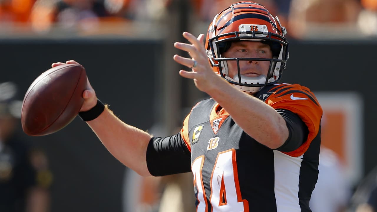 Andy Dalton offers Joe Burrow advice as he passes Bengals torch