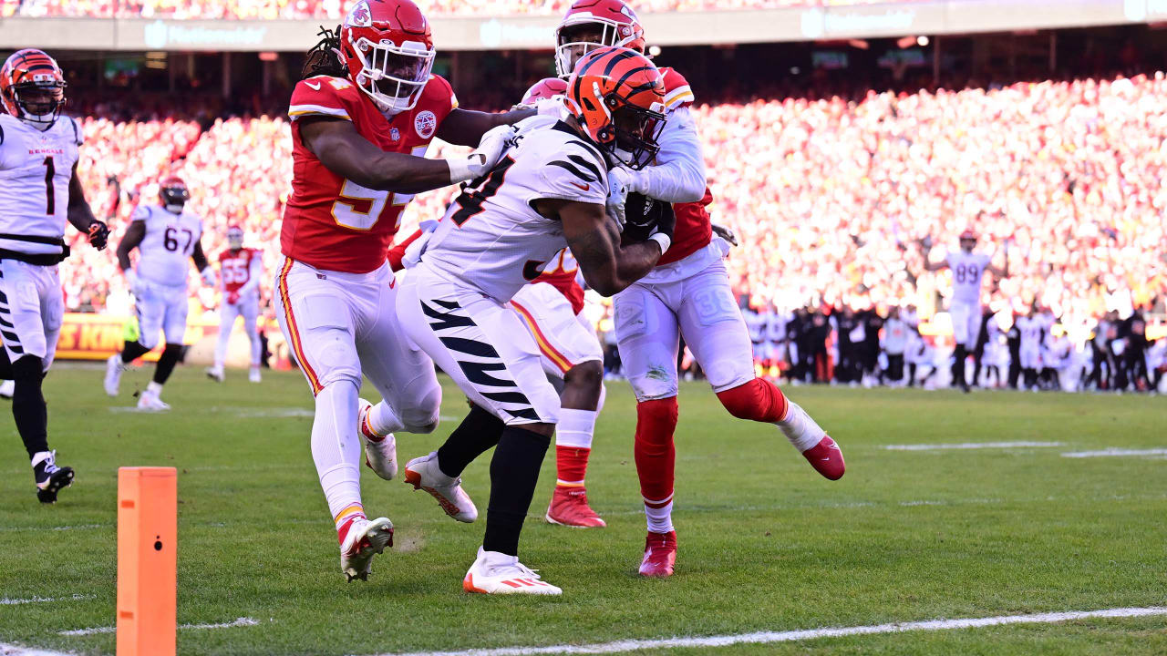 Cincinnati Bengals running back Samaje Perine (34) gets past Kansas City  Chiefs defensive end T …